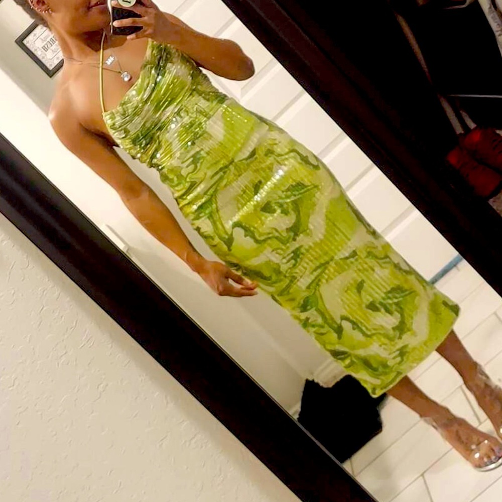 It’s a mint green dress that has a mermaid core style